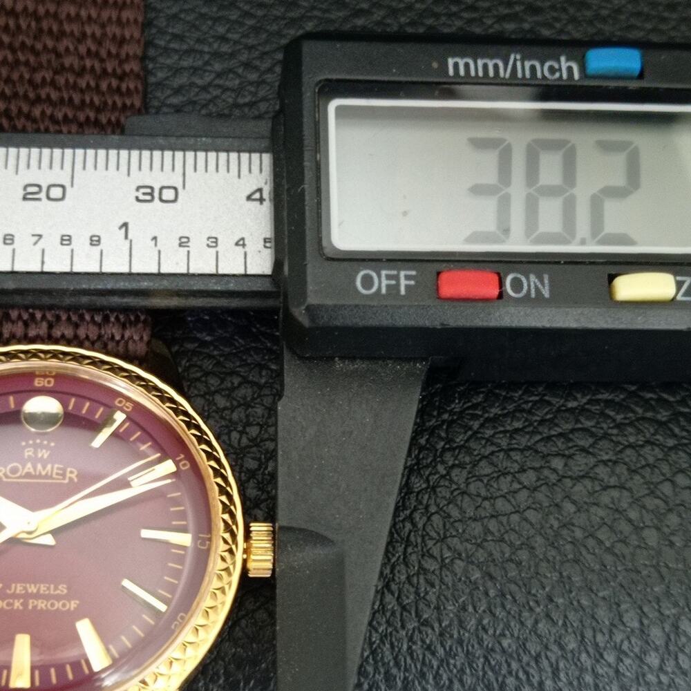 Vintage 1984 Roamer Manual Mens Gold Watch W/Nato Strap & Red accents - Picture 7 of 9